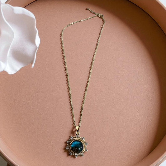 Fio aço inoxidável dourado sol com pedra azul