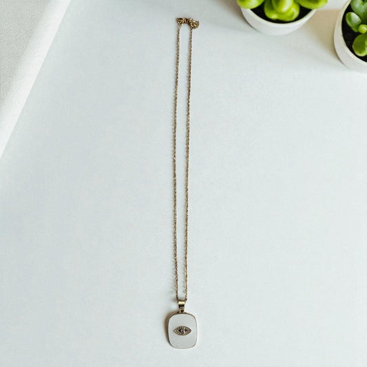 Fio aço inoxidável dourado com medalha branca com  🧿